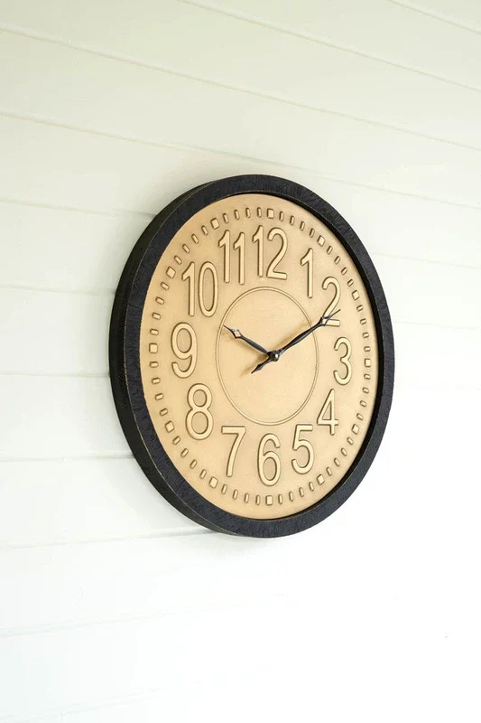 Black frame round metal & wood wall clock with brass detail