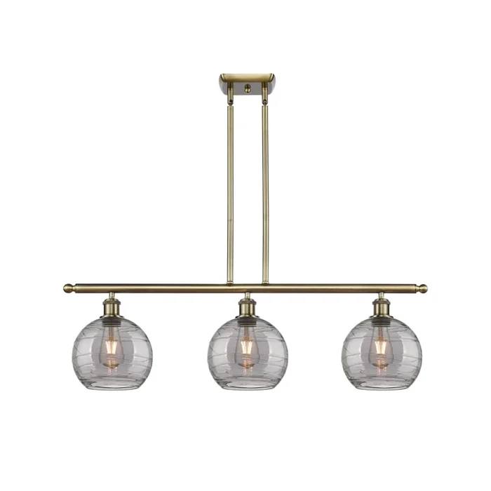Innovations Lighting Athens Deco Swirl 3 Light 36″ Wide Linear Chandelier with 8″ Wide Shades