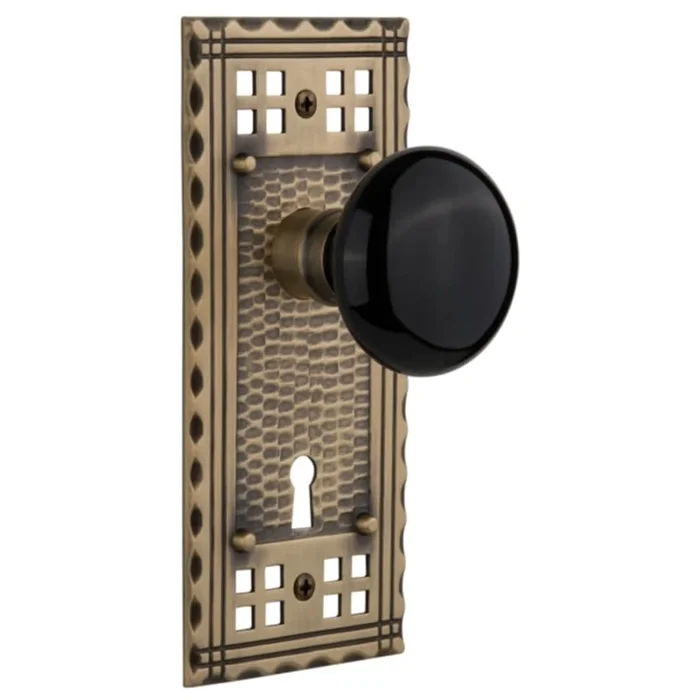Nostalgic Warehouse Black Porcelain Solid Brass Privacy Door Knob Set with Long Craftsman Plate, Keyhole and 2-3/8″ Backset