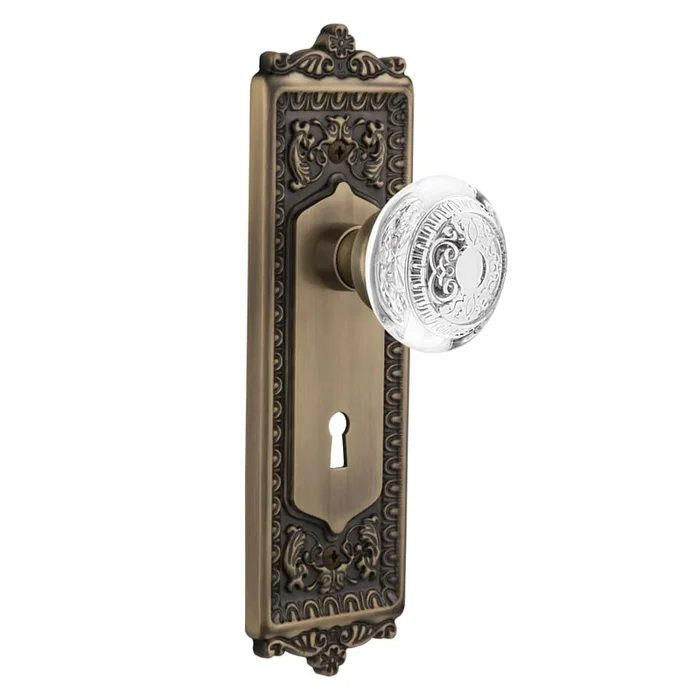 Nostalgic Warehouse Vintage Crystal Egg and Dart Privacy Door Knob Set with Egg & Dart Rose, 2-3/8″ Backset and Decorative Keyhole