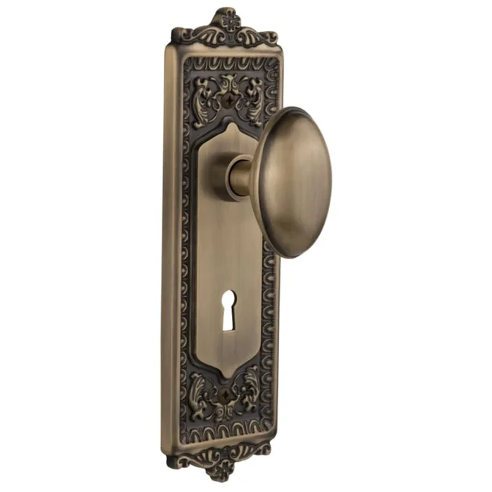 Nostalgic Warehouse Vintage Victorian Homestead Solid Brass Dummy Door Knob Set with Egg and Dart Rose and Keyhole