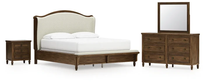 Sturlayne California King Upholstered Panel Bed with Mirrored Dresser and Nightstand