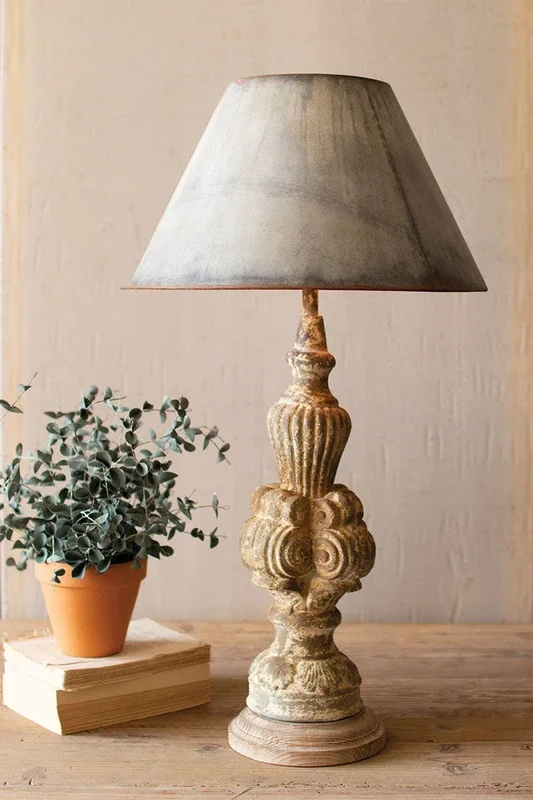 Table lamp with sculpted base and galvanized shade